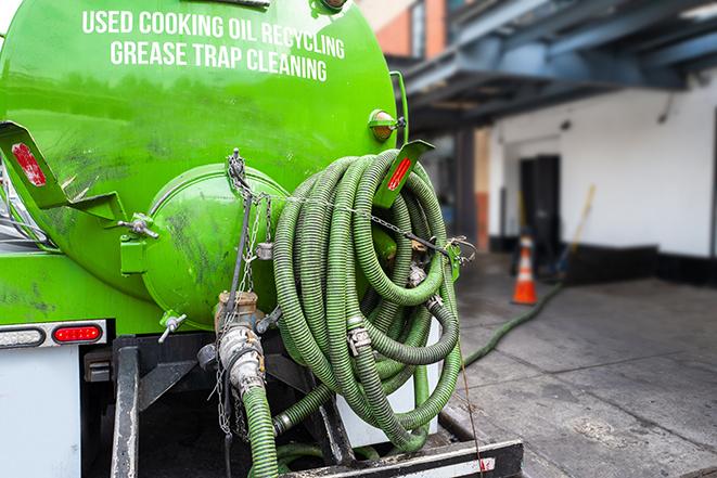 large truck pumping grease trap at a restaurant in Breckenridge